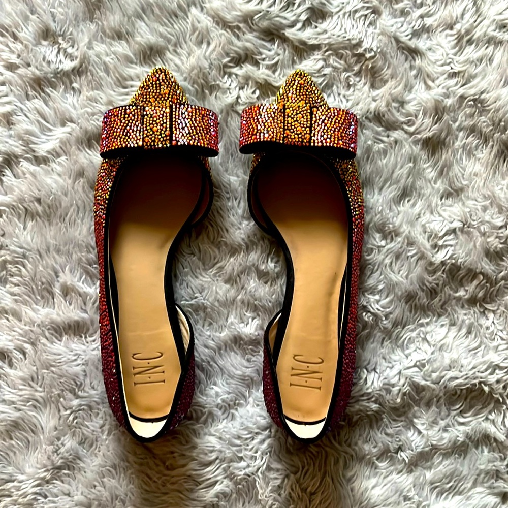 Never worn iridescent sparkly shoes.
